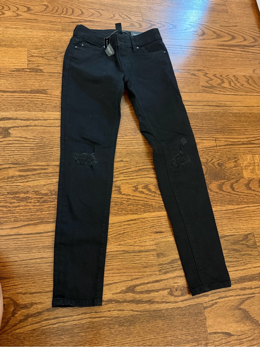 White House Black Market Black Skinny Jeans with Knee Distress